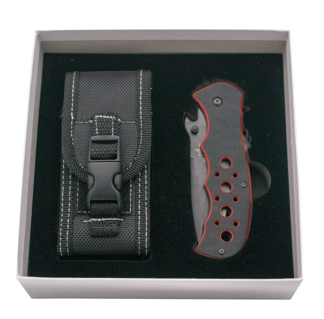 Coltello con apertura assistita e impugnatura in G10 bicolore rosso e nero con lama seghettata